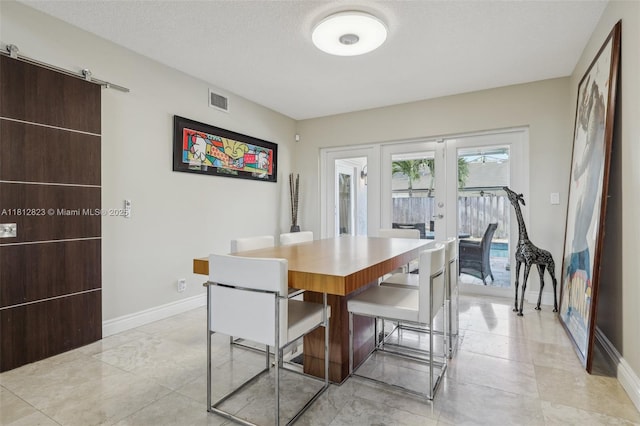 15050 E Falcons Lea Dr, Davie, FL 33331 - dining room featuring french doors, baseboards, and light tile patterned flooring