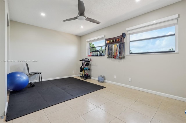 15050 E Falcons Lea Dr, Davie, FL 33331 - exercise room featuring ceiling fan, recessed lighting, baseboards, and tile patterned flooring