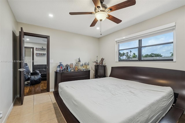 15050 E Falcons Lea Dr, Davie, FL 33331 - bedroom featuring baseboards, light tile patterned floors, a ceiling fan, and recessed lighting