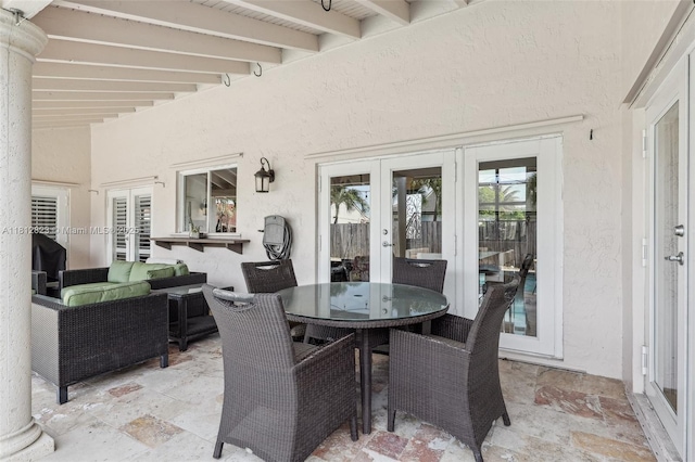 15050 E Falcons Lea Dr, Davie, FL 33331 - view of patio featuring french doors and outdoor dining area