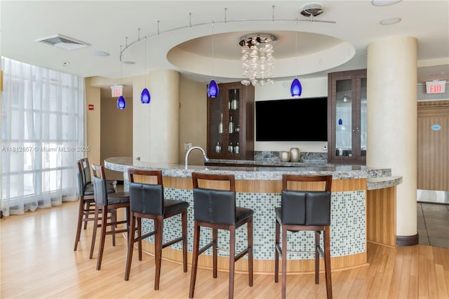 253 NE 2nd St Unit 3108, Miami, FL 33132 - bar featuring wood finished floors and a sink