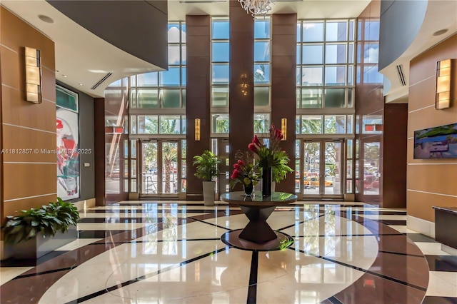 253 NE 2nd St Unit 3108, Miami, FL 33132 - lobby with a towering ceiling, expansive windows, and recessed lighting