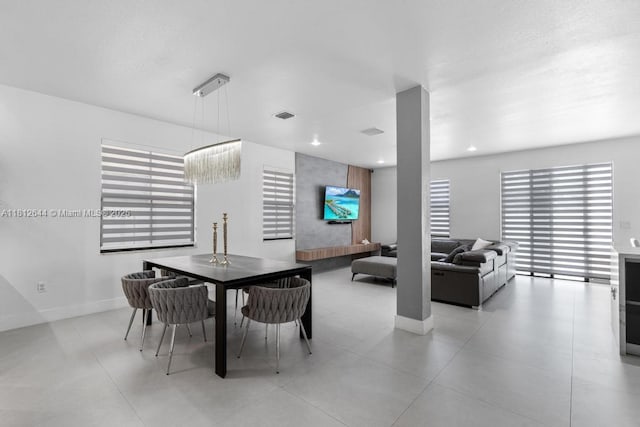 10023 NW 89th Ter, Doral, FL 33178 - dining area featuring baseboards
