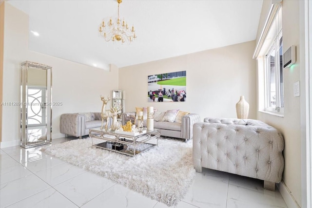 8902 NW 148th St, Miami Lakes, FL 33018 - living room featuring marble look tile flooring, a chandelier, and baseboards