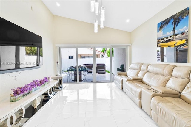 8902 NW 148th St, Miami Lakes, FL 33018 - living area with lofted ceiling, marble finish flooring, french doors, healthy amount of natural light, and recessed lighting