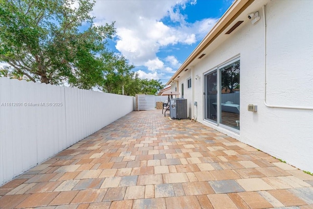 8902 NW 148th St, Miami Lakes, FL 33018 - view of patio with central AC unit