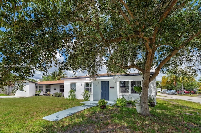 504 SW 5th Ave, Hallandale Beach, FL 33009 - single story home with a front lawn and stucco siding