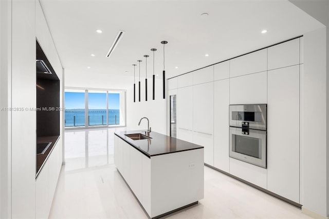 300 Biscayne Boulevard Way Unit 1904C, Miami, FL 33131 - kitchen with modern cabinets, a sink, floor to ceiling windows, and recessed lighting