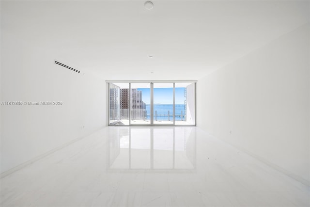 300 Biscayne Boulevard Way Unit 1904C, Miami, FL 33131 - unfurnished room with expansive windows and a water view