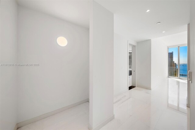 300 Biscayne Boulevard Way Unit 1904C, Miami, FL 33131 - corridor featuring baseboards and recessed lighting