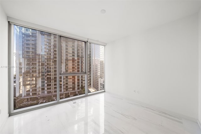 300 Biscayne Boulevard Way Unit 1904C, Miami, FL 33131 - spare room with a wall of windows