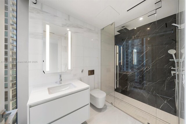 300 Biscayne Boulevard Way Unit 1904C, Miami, FL 33131 - full bathroom with toilet, vanity, a marble finish shower, and tile walls