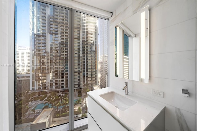 300 Biscayne Boulevard Way Unit 1904C, Miami, FL 33131 - bathroom featuring vanity and a city view