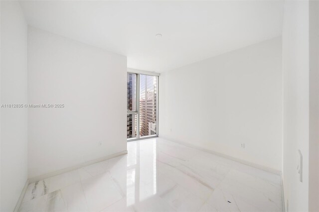 300 Biscayne Boulevard Way Unit 1904C, Miami, FL 33131 - unfurnished room featuring marble finish floors and baseboards