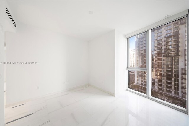 300 Biscayne Boulevard Way Unit 1904C, Miami, FL 33131 - unfurnished room with baseboards