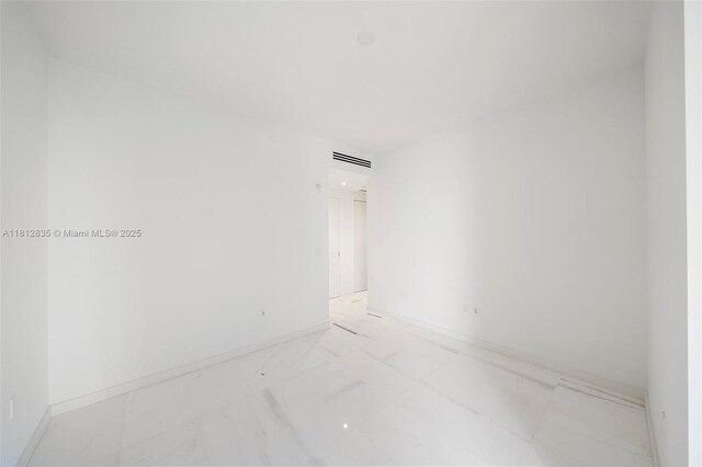 300 Biscayne Boulevard Way Unit 1904C, Miami, FL 33131 - empty room with light marble finish floors and baseboards