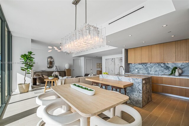 500 Alton Rd Unit 1603, Miami Beach, FL 33139 - dining room with dark wood-style floors, a chandelier, and recessed lighting