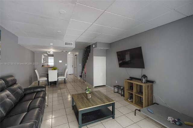 8022 SW 151st Ct Unit 603, Miami, FL 33193 - living area featuring a drop ceiling and light tile patterned floors