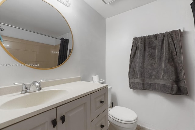 8022 SW 151st Ct Unit 603, Miami, FL 33193 - bathroom with vanity, toilet, and a shower with curtain