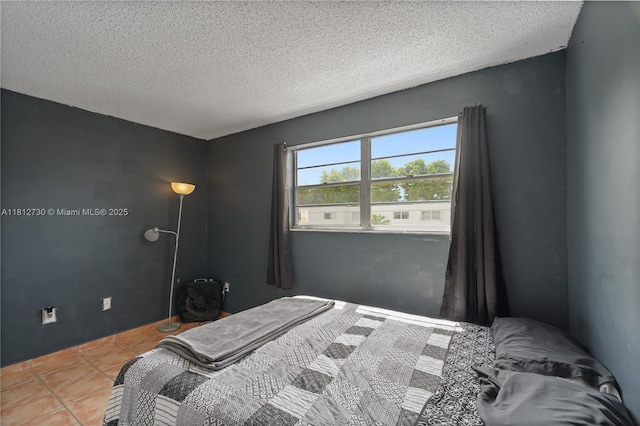 8022 SW 151st Ct Unit 603, Miami, FL 33193 - bedroom featuring a textured ceiling and tile patterned floors