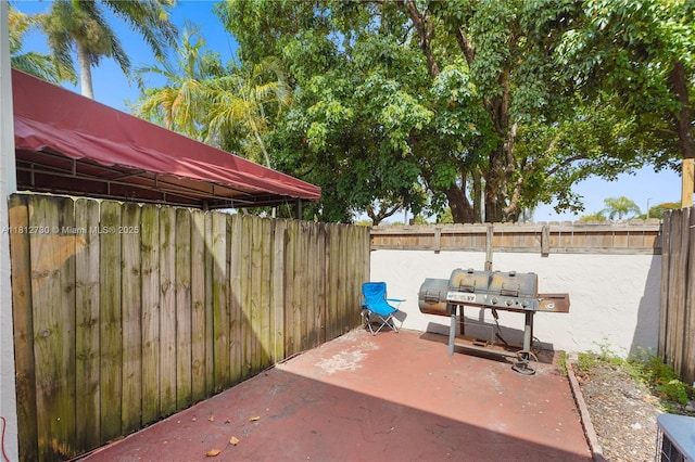 8022 SW 151st Ct Unit 603, Miami, FL 33193 - view of patio featuring a grill