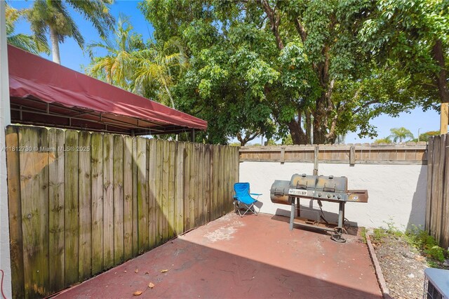 8022 SW 151st Ct Unit 603, Miami, FL 33193 - view of patio featuring a grill