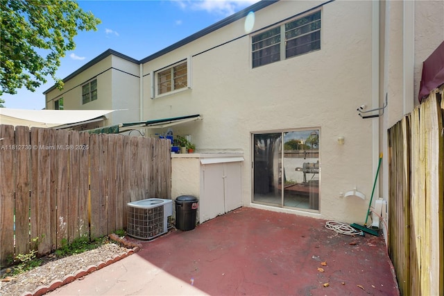 8022 SW 151st Ct Unit 603, Miami, FL 33193 - view of patio featuring central AC unit