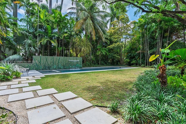 621 NE 55th St, Miami, FL 33137 - view of grassy yard featuring an outdoor pool