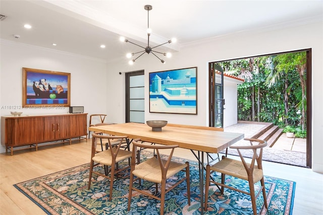 621 NE 55th St, Miami, FL 33137 - dining room featuring light wood-style flooring, crown molding, a chandelier, and recessed lighting
