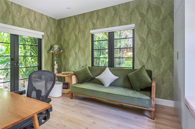 621 NE 55th St, Miami, FL 33137 - office space featuring wallpapered walls, french doors, wood finished floors, and baseboards