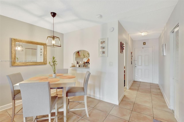 9972 SW 88th St Unit 1128, Miami, FL 33176 - dining space featuring light tile patterned floors and baseboards