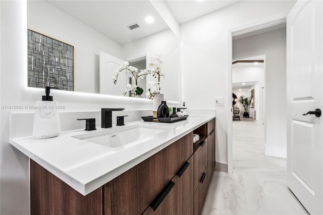 4029 NW 72nd Ave, Coral Springs, FL 33065 - full bathroom featuring marble look tile flooring, double vanity, and recessed lighting