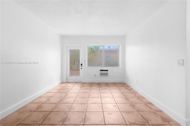 8040 Tatum Waterway Dr Unit 12, Miami Beach, FL 33141 - spare room with light tile patterned flooring and baseboards