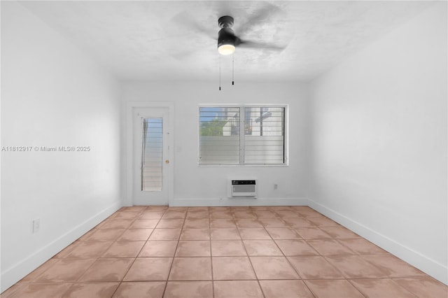 8040 Tatum Waterway Dr Unit 12, Miami Beach, FL 33141 - tiled spare room featuring ceiling fan, heating unit, and baseboards