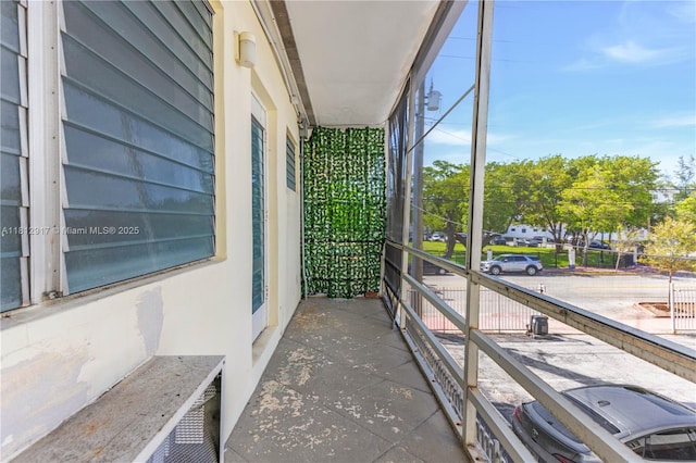 8040 Tatum Waterway Dr Unit 12, Miami Beach, FL 33141 - unfurnished sunroom featuring plenty of natural light