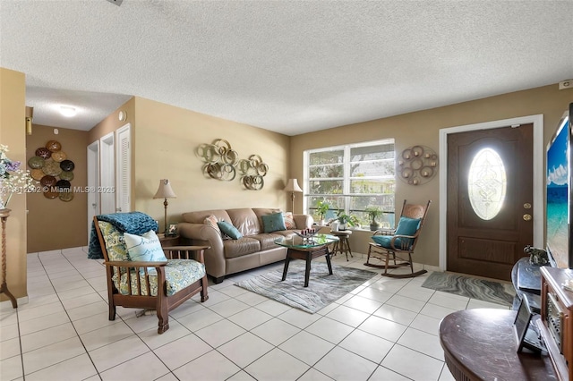 5714 NW 66th Ter, Tamarac, FL 33321 - living area featuring a textured ceiling and light tile patterned floors