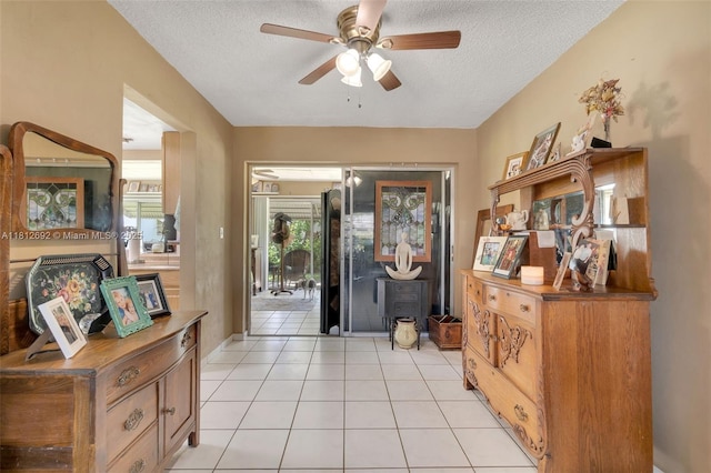 5714 NW 66th Ter, Tamarac, FL 33321 - foyer with a textured ceiling, ceiling fan, and light tile patterned floors