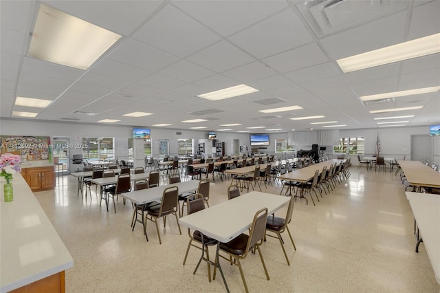 5714 NW 66th Ter, Tamarac, FL 33321 - dining area featuring a paneled ceiling and dark speckled floor