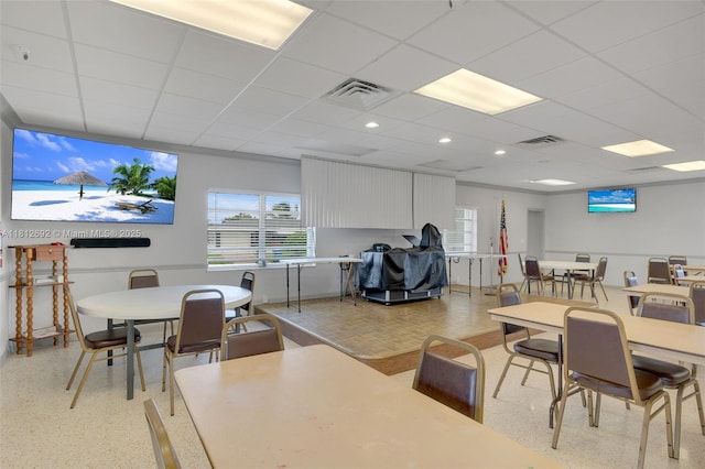 5714 NW 66th Ter, Tamarac, FL 33321 - dining area with dark aggregate flooring and a drop ceiling