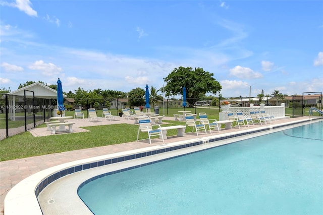 5714 NW 66th Ter, Tamarac, FL 33321 - community pool with a patio
