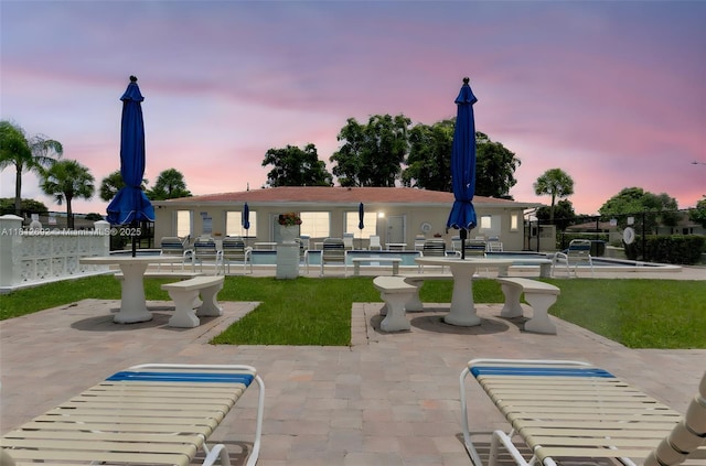 5714 NW 66th Ter, Tamarac, FL 33321 - surrounding community featuring a swimming pool and a patio area