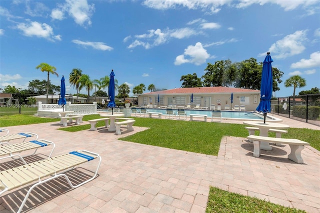 5714 NW 66th Ter, Tamarac, FL 33321 - community pool with a patio area