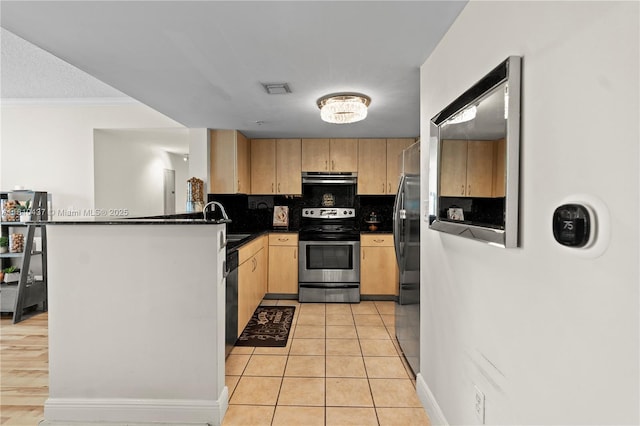 3000 Coral Way Unit 510, Miami, FL 33145 - kitchen featuring stainless steel appliances, light brown cabinets, exhaust hood, dark countertops, and decorative backsplash