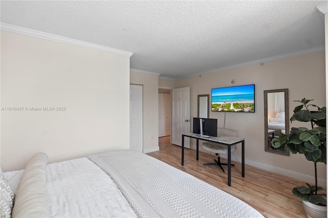 3000 Coral Way Unit 510, Miami, FL 33145 - bedroom with wood finished floors, baseboards, crown molding, and a textured ceiling