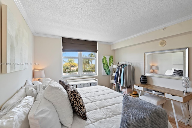 3000 Coral Way Unit 510, Miami, FL 33145 - bedroom with a textured ceiling, ornamental molding, and wood finished floors