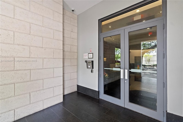 3000 Coral Way Unit 510, Miami, FL 33145 - doorway to property with concrete block siding