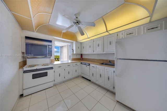 800 Parkview Dr Unit 729, Hallandale Beach, FL 33009 - kitchen featuring white appliances, a sink, a ceiling fan, light countertops, and white cabinets