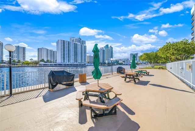 800 Parkview Dr Unit 729, Hallandale Beach, FL 33009 - view of patio / terrace with a city view, a water view, and area for grilling