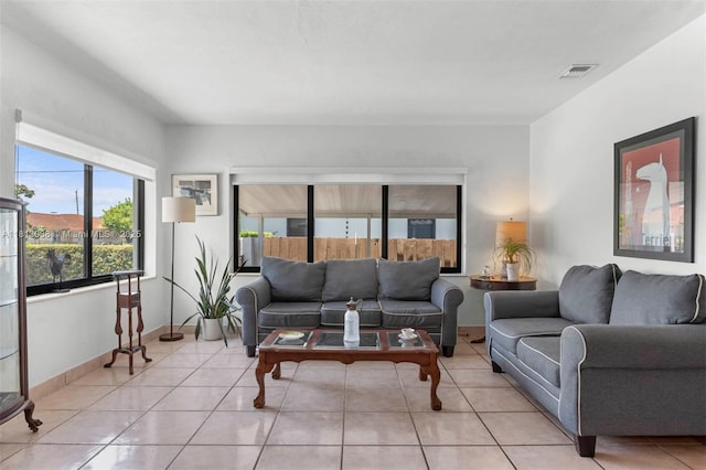525 NW 32nd Ave, Miami, FL 33125 - living area with light tile patterned floors and baseboards