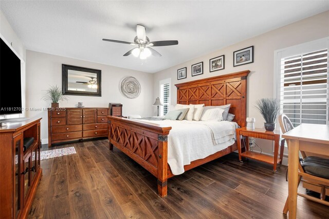 6459 Ungerer St, Jupiter, FL 33458 - bedroom featuring dark wood finished floors and ceiling fan